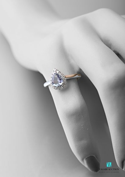 null Ring in white gold rhodium 750 thousandth set with a tanzanite of pear size...