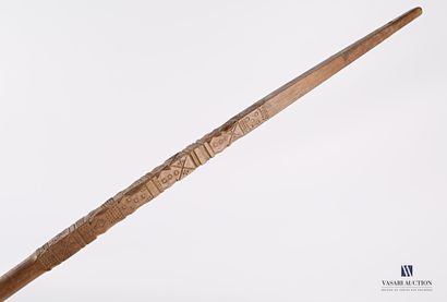 null Straight wooden cattail with carved and engraved geometrical motifs on several...