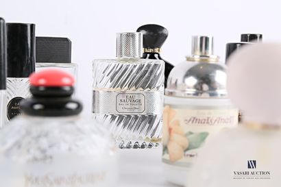 null Lot of about forty-seven glass and plastic perfume bottles of various brands...