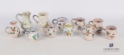 null Lot of eleven earthenware miniature cups and pitchers with polychrome decoration...