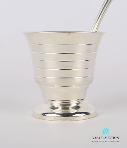 null Egg cup and its spoon in silver plated metal, the body decorated with alternating...