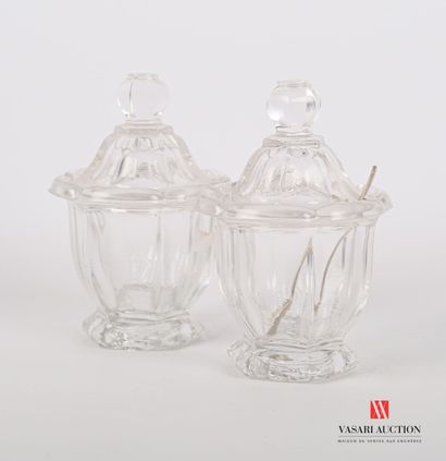 null A pair of molded glass mustard pots with cut sides and a hexagonal base. 

(chips...