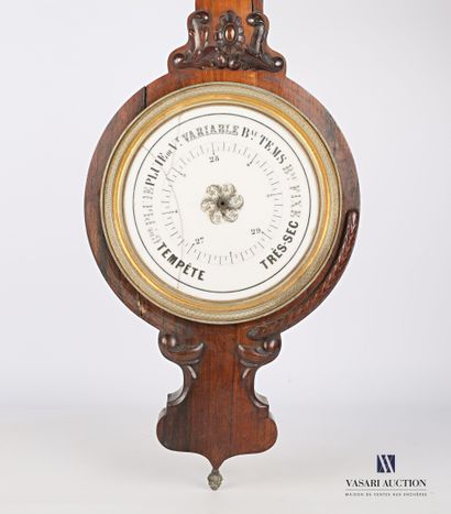 null Barometer in carved natural wood and wood veneer, the round enamel dial is hemmed...
