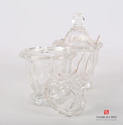 null A pair of molded glass mustard pots with cut sides and a hexagonal base. 

(chips...