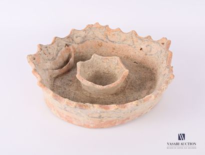 null Round terracotta candlestick, the crenellated edge and the basin with painted...