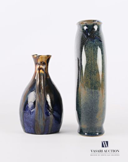 null A varnished stoneware lot comprising an ovoid vase, the flattened body, marked...