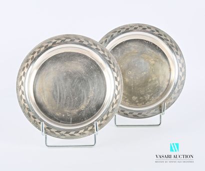 null Pair of silver plated coasters, the border hemmed with a frieze of staggered...