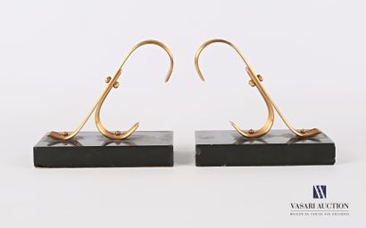null GOLD STARRY

Pair of bookends featuring a free form stiré in metal resting on...