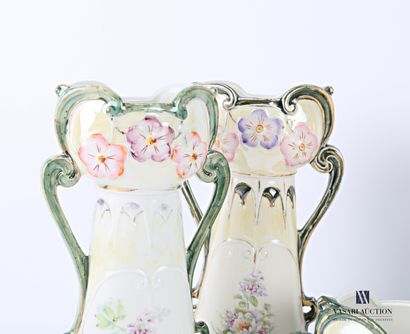  Porcelain set including a jardinière and four vases decorated with bouquets of flowers...