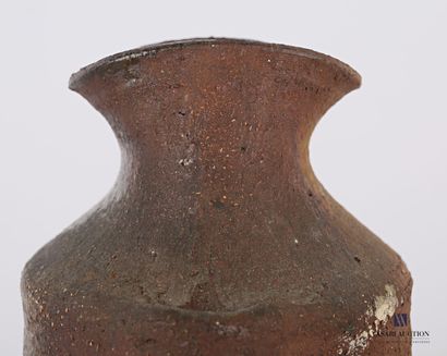 null Stoneware vase of truncated cone shape, the grooved body flanked by two handles...