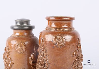 null BEAUVAIS

Set of two stoneware tobacco jars in bottle form, one with a pewter...