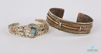 null Set of two bracelets including a metal and copper bracelet decorated with friezes...