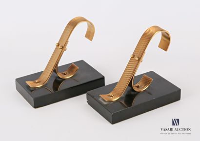 null GOLD STARRY

Pair of bookends featuring a free form stiré in metal resting on...