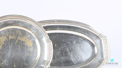 null Suite of three silver plated dishes, one round and two oval, the edge hemmed...