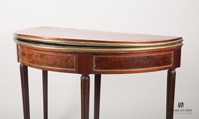 null Mahogany and mahogany veneer half-moon game table inlaid in leaf in brass fillet...