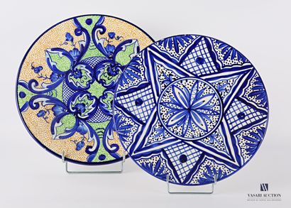 Set of two glazed terracotta dishes decorated...
