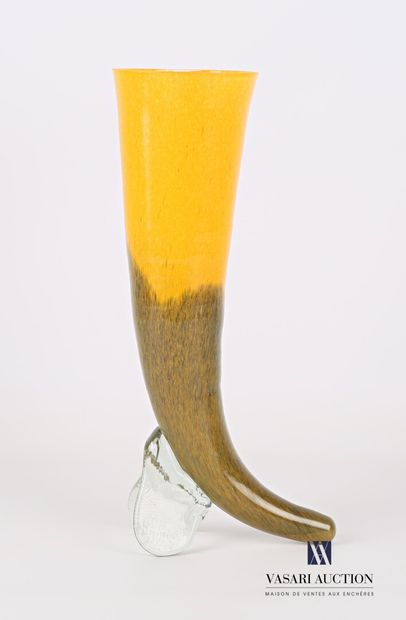 null Vase in blown and tinted glass amber and green in the shape of horn resting...