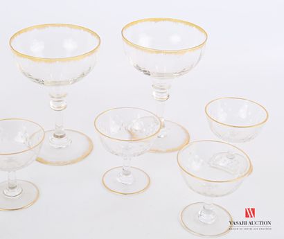 null Set of three champagne glasses and six liqueur glasses decorated with stylized...