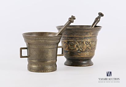 null Set of two bronze mortars and pestles, the first one decorated with a granular...