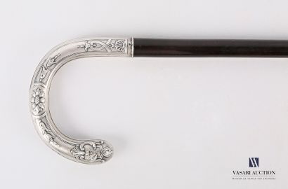 null Rosewood stick, the silver pommel with a lotus flower flanked by flower falls...