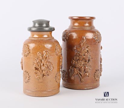 null BEAUVAIS

Set of two stoneware tobacco jars in bottle form, one with a pewter...