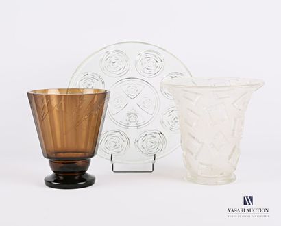  Smoked glass vase with cut sides, the body engraved with stylized lightning motifs...
