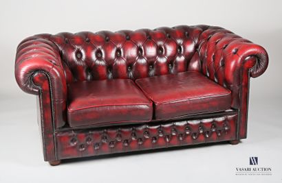 null Chesterfield sofa in imitation leather, cherry color, the back upholstered,...