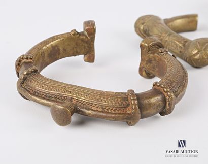 null AFRICA

Set of three bronze bracelets or shackles decorated with twisted stripes,...