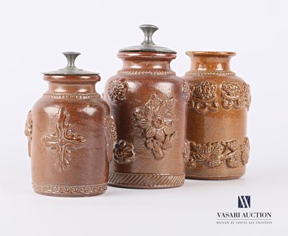 null BEAUVAIS

Three stoneware tobacco jars in bottle form, the lid in pewter and...