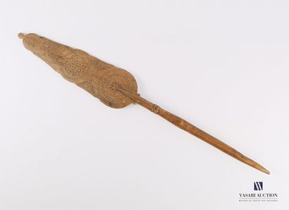 null Wooden stave with lanceolate palette with engraved decoration of leafy rosettes...