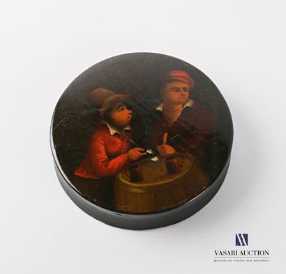  Round box in paper maché, the lid decorated with characters drinking a glass sitting...