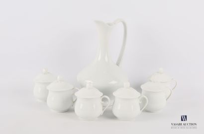 A white porcelain set comprising a baluster-shaped...