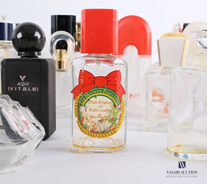 null Lot of about fifty-seven glass and plastic perfume bottles of various brands...