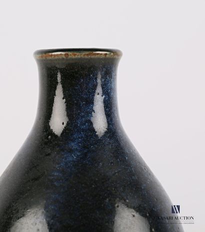 null A midnight blue enamelled terracotta ovoid vase

Signed on the back Christian...