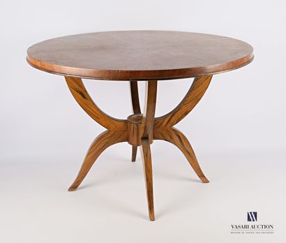 null Veneer pedestal table, the round top rests on four arched uprights joined by...