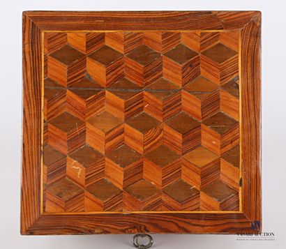 null A square veneered box with a lid decorated with a checkerboard pattern and engraved...