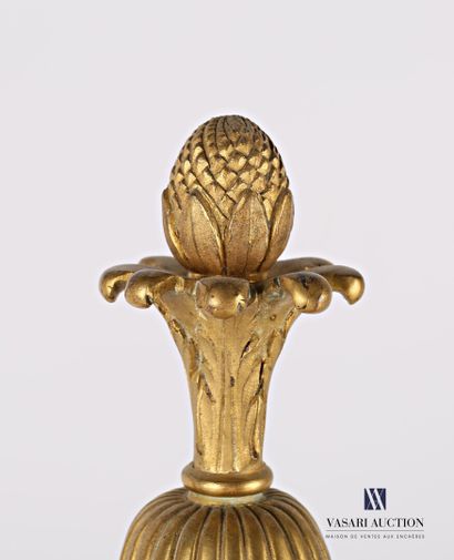 null An important gilt bronze lampstand standing on a round base with a doucine hemmed...