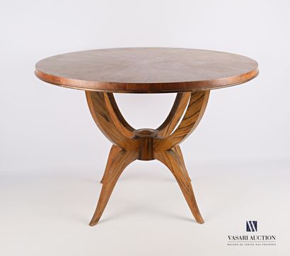 null Veneer pedestal table, the round top rests on four arched uprights joined by...