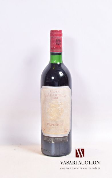 null 1 bouteille	Château LA FLEUR DE GAY	Pomerol	1982

	Et. fanée et tachée. N :...