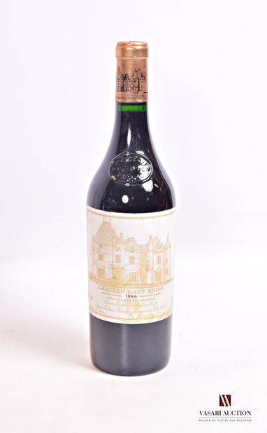 null 1 bouteille	Château HAUT BRION	Graves 1er GCC	1986

	Et. fanée et tachée. N...
