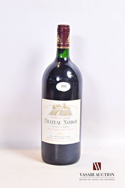 null 1 magnum	Château NODOT	Côtes de Bourg	1995

	Et. un peu tachée (1 accroc). N...