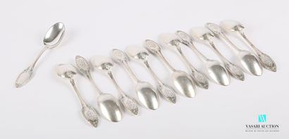 null Set of twelve silver spoons, the handle ending in an ogive is decorated with...