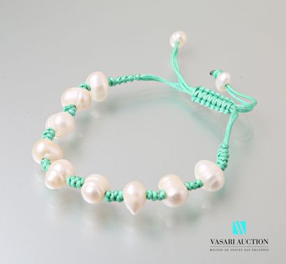 null Shamballa bracelet with fresh water pearls on green cotton cord