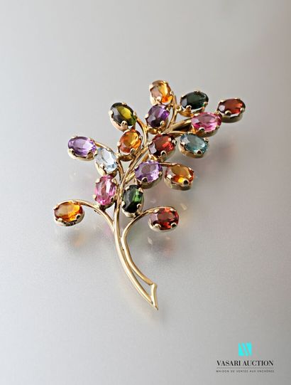null Brooch leaf in yellow gold 750 thousandth set with seventeen oval stones.

Gross...