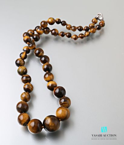null Necklace in fall of pearls of eye of tiger from 6,8 mm to 16,1 mm, the clasp...