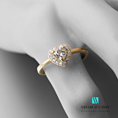 null Ring in vermeil 925 thousandths with a heart set with a very clear aquamarine...