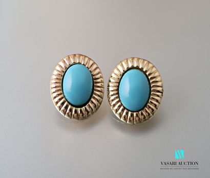 null Pair of gold plated and blue glass paste earrings 2,3 x 2 cm.