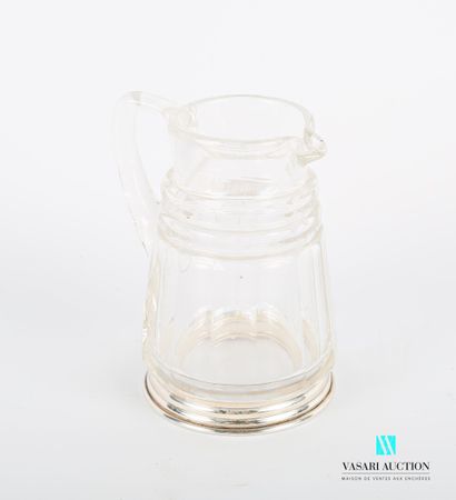 null Crystal milk jug with cut sides decorated with two notched rings, it rests on...