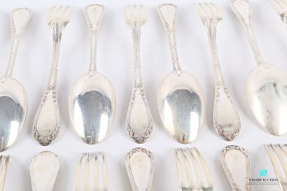 null 
A set of twelve silver flatware, the silver handle decorated with filets and...