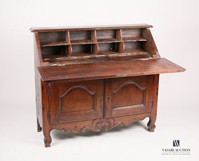 null Sloping desk in moulded and carved oak, the upper part opens with a flap revealing...